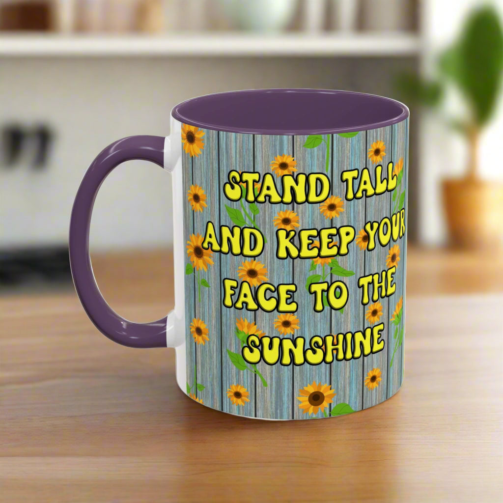 ceramic mug with sunflower background quote "Stand tall and keep your face to the sunshine" purple interior purple handle
