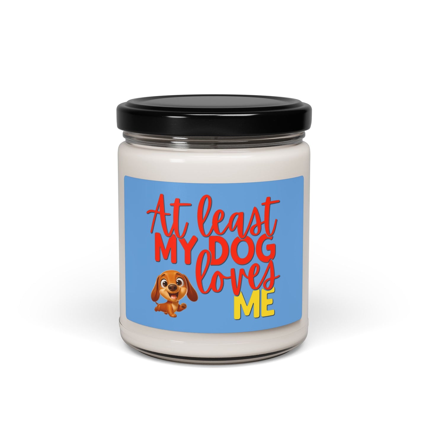 Soy candle with "At least my dog loves me" with small Dachshund