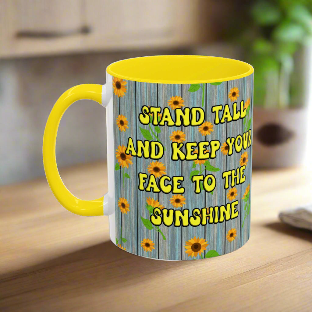 ceramic mug with sunflower background quote "Stand tall and keep your face to the sunshine" yellow interior yellow handle