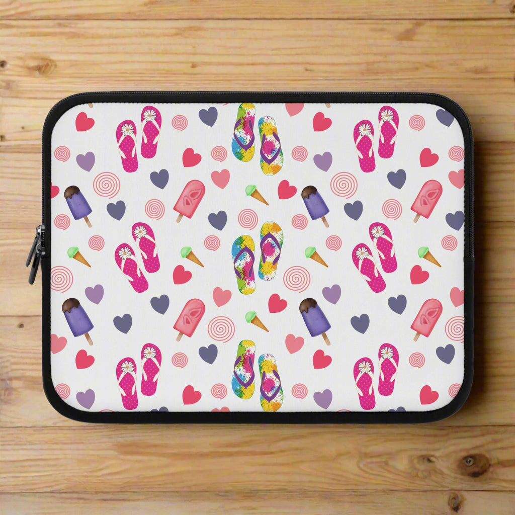 Laptop sleeve with colorful flip-flop, ice cream, and heart pattern on a white background