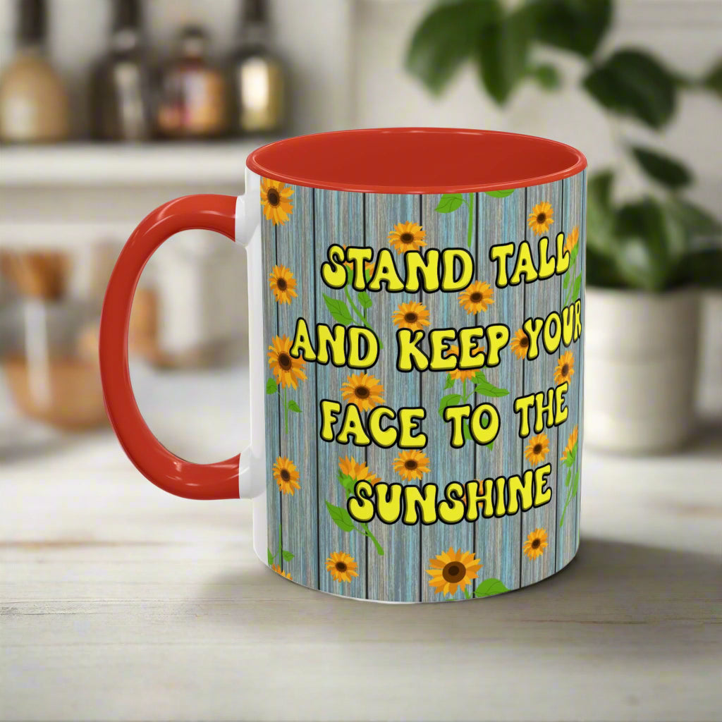 ceramic mug with sunflower background quote "Stand tall and keep your face to the sunshine" red interior red handle