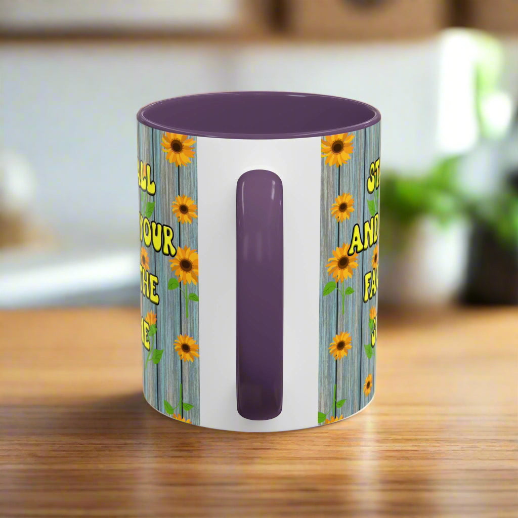 ceramic mug with sunflower background quote "Stand tall and keep your face to the sunshine" purple interior purple handle