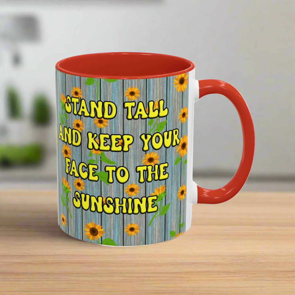 ceramic mug with sunflower background quote "Stand tall and keep your face to the sunshine" red interior red handle