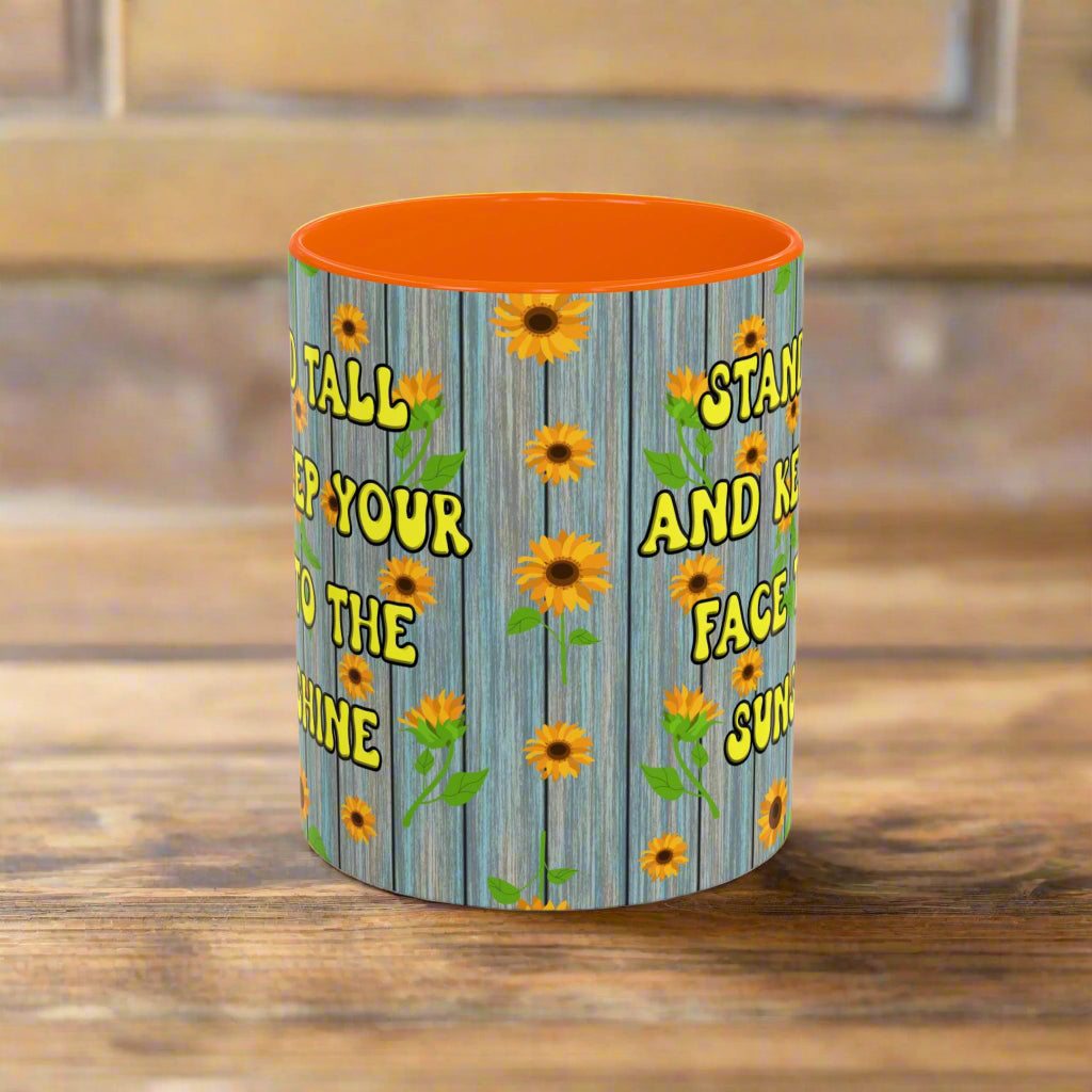 ceramic mug with sunflower background quote "Stand tall and keep your face to the sunshine" orange interior