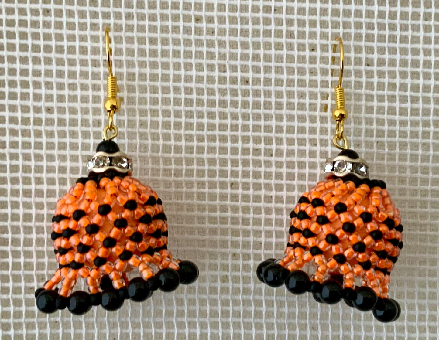orange and black seed bead earrings bell shaped