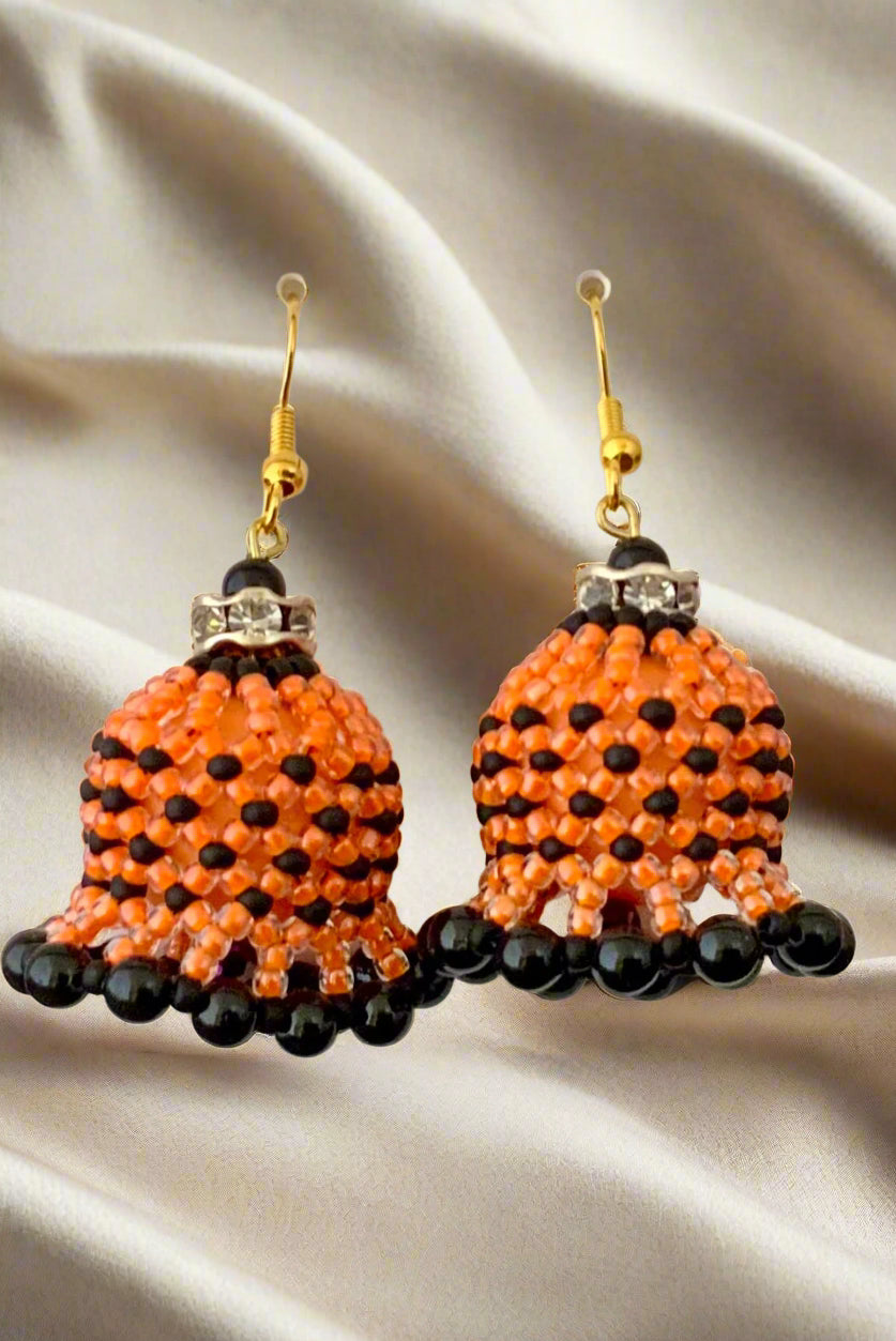 orange and black earrings with black pearls