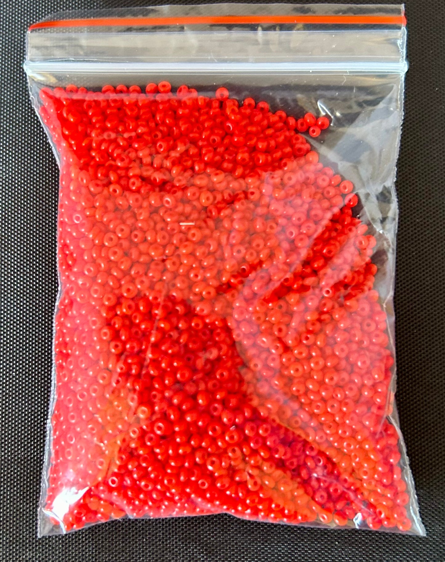 32 gram bag of red chez 11/0 seed beads approx 4080 seed beads