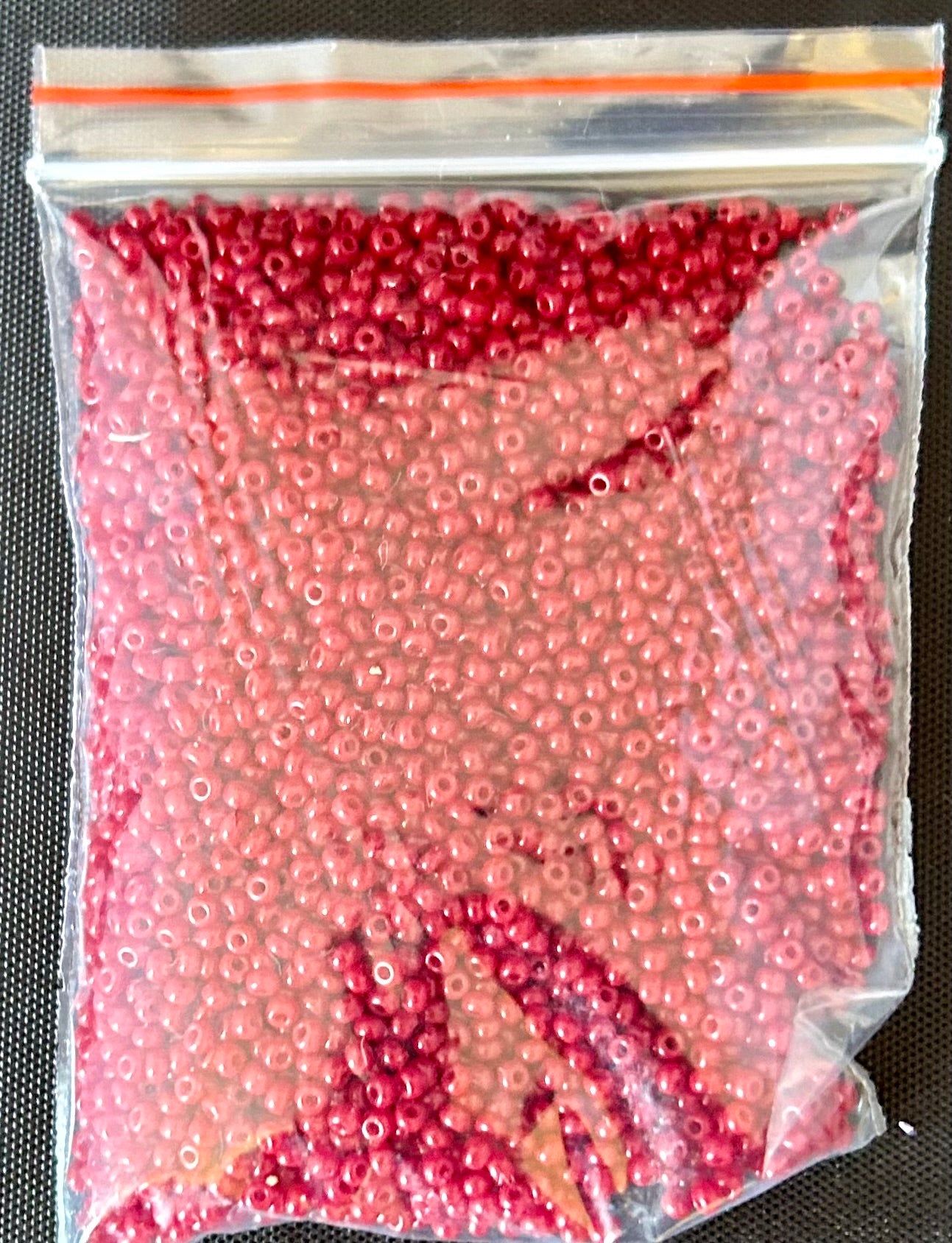 32 gram bag of red chez 11/0 seed beads approx 4080 seed beads