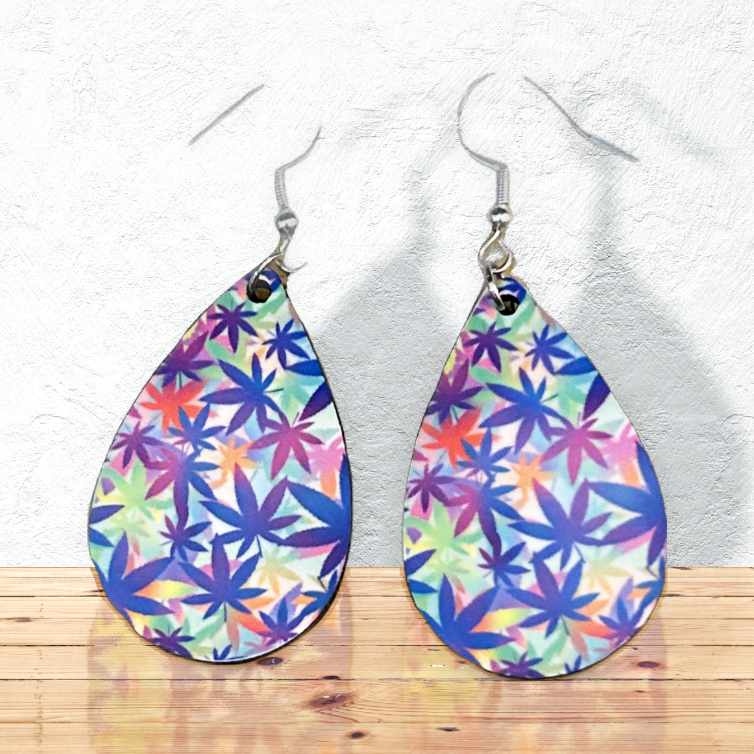 light blue teardrop cannabis earrings on shelf