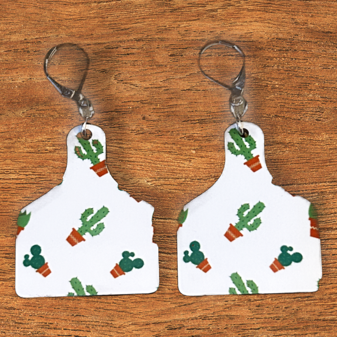 cutting board shaped earrings with cactus in pots with silver latch ear wires