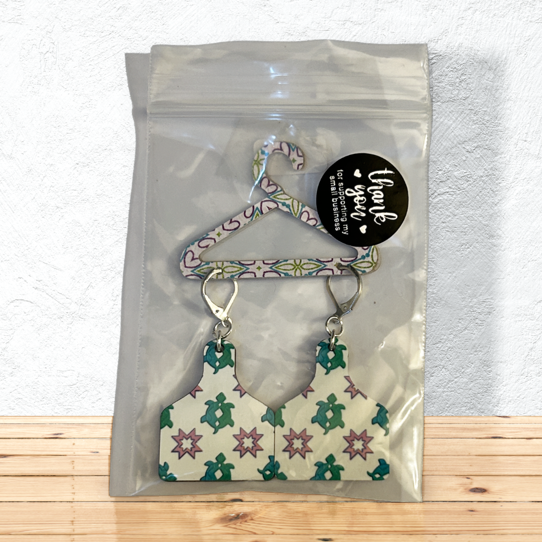 cutting board shaped earrings with green turtles with silver latch ear wires