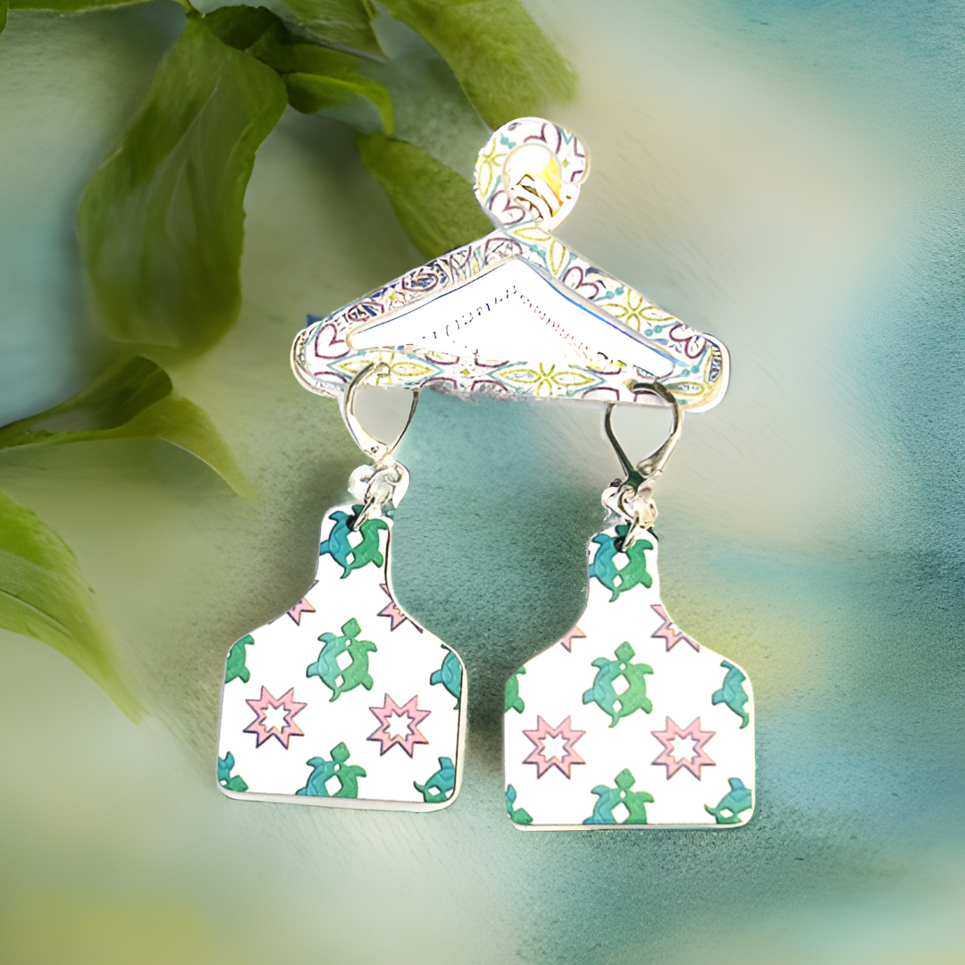 cutting board shaped earrings with green turtles with silver latch ear wires