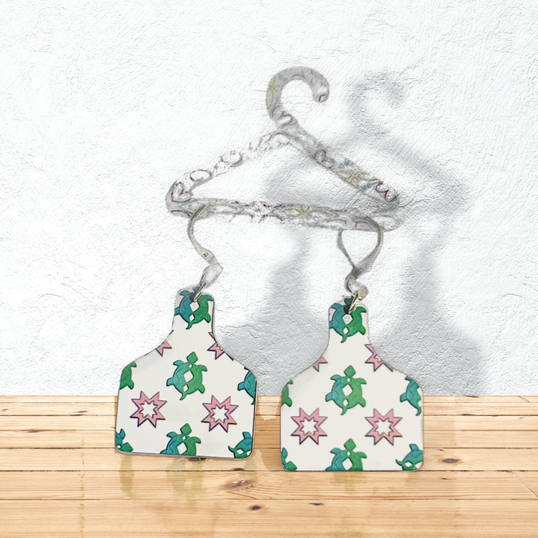cutting board shaped earrings with green turtles with silver latch ear wires