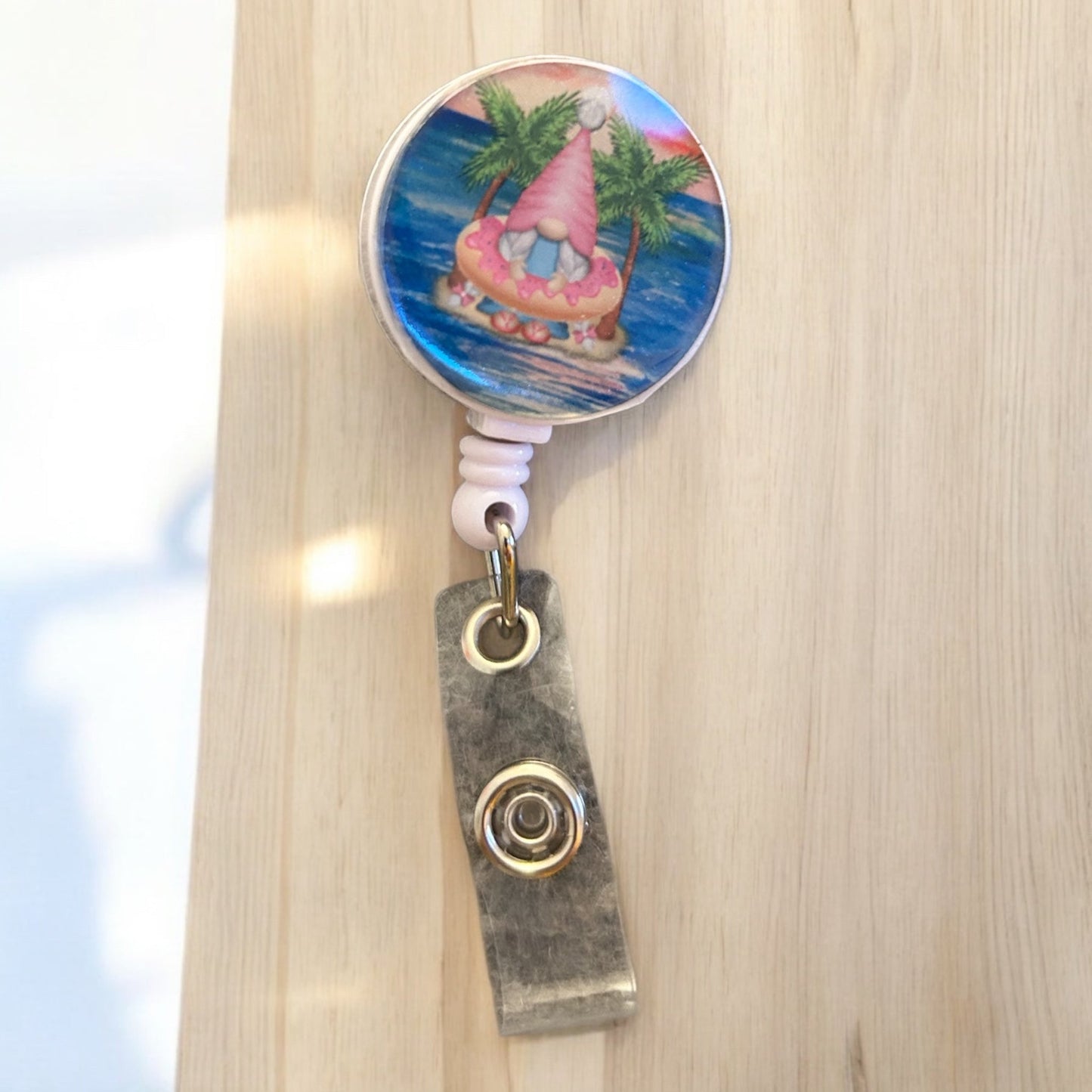 gnome on island on badge reel with badge holder