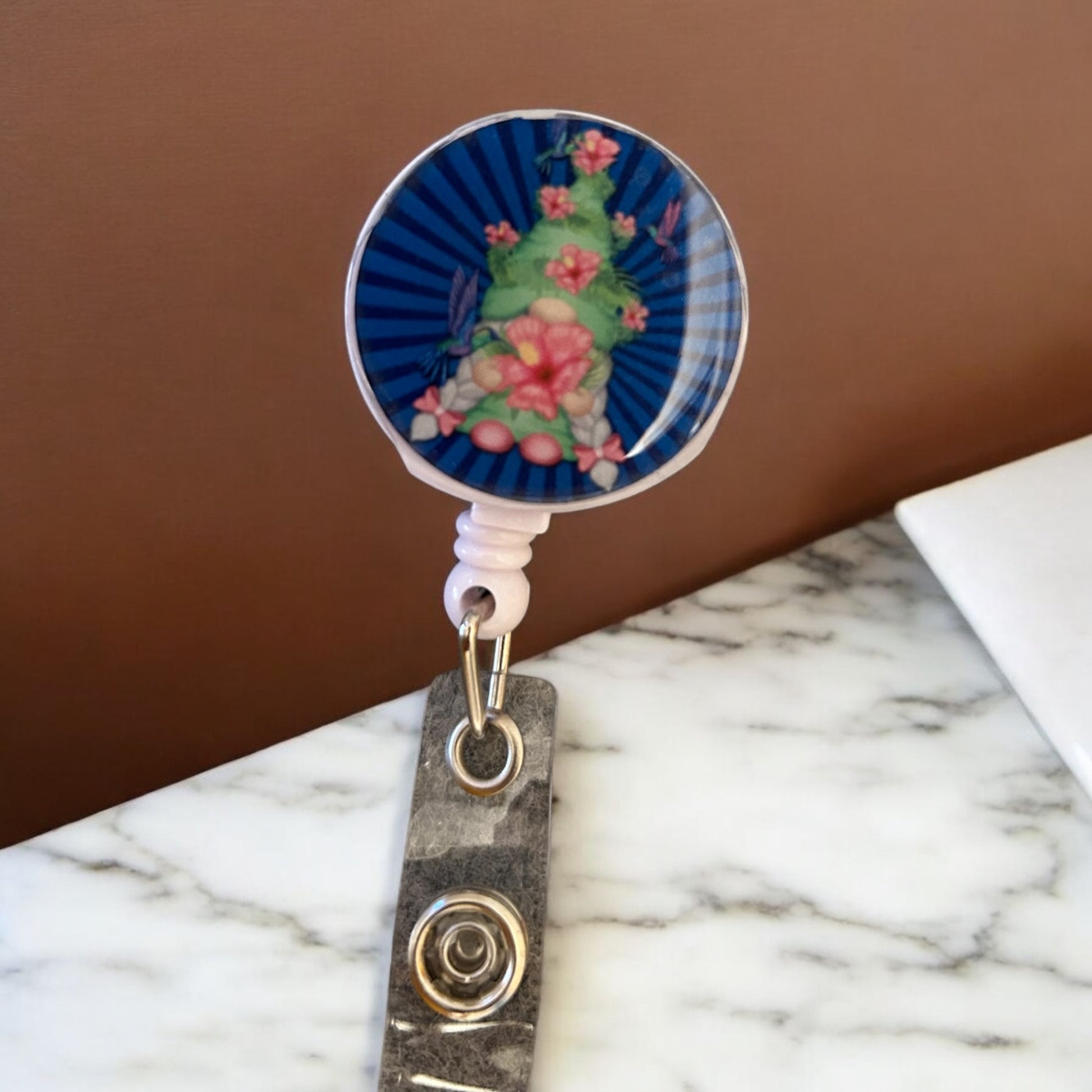 girl gnome with orchid on  badge reel with badge holder