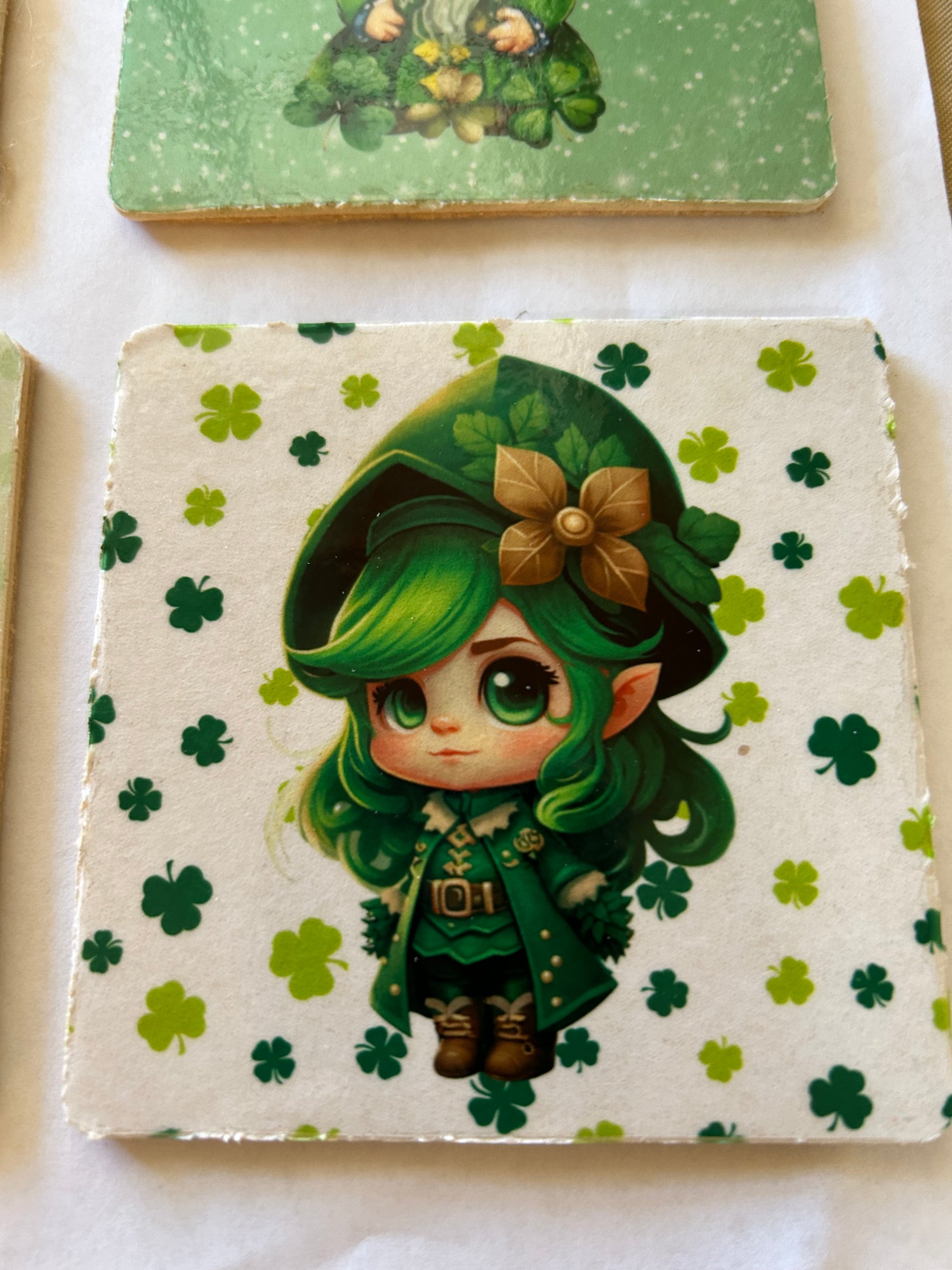 St Patricks day lady leprechaun design on 4" hardboard coaster