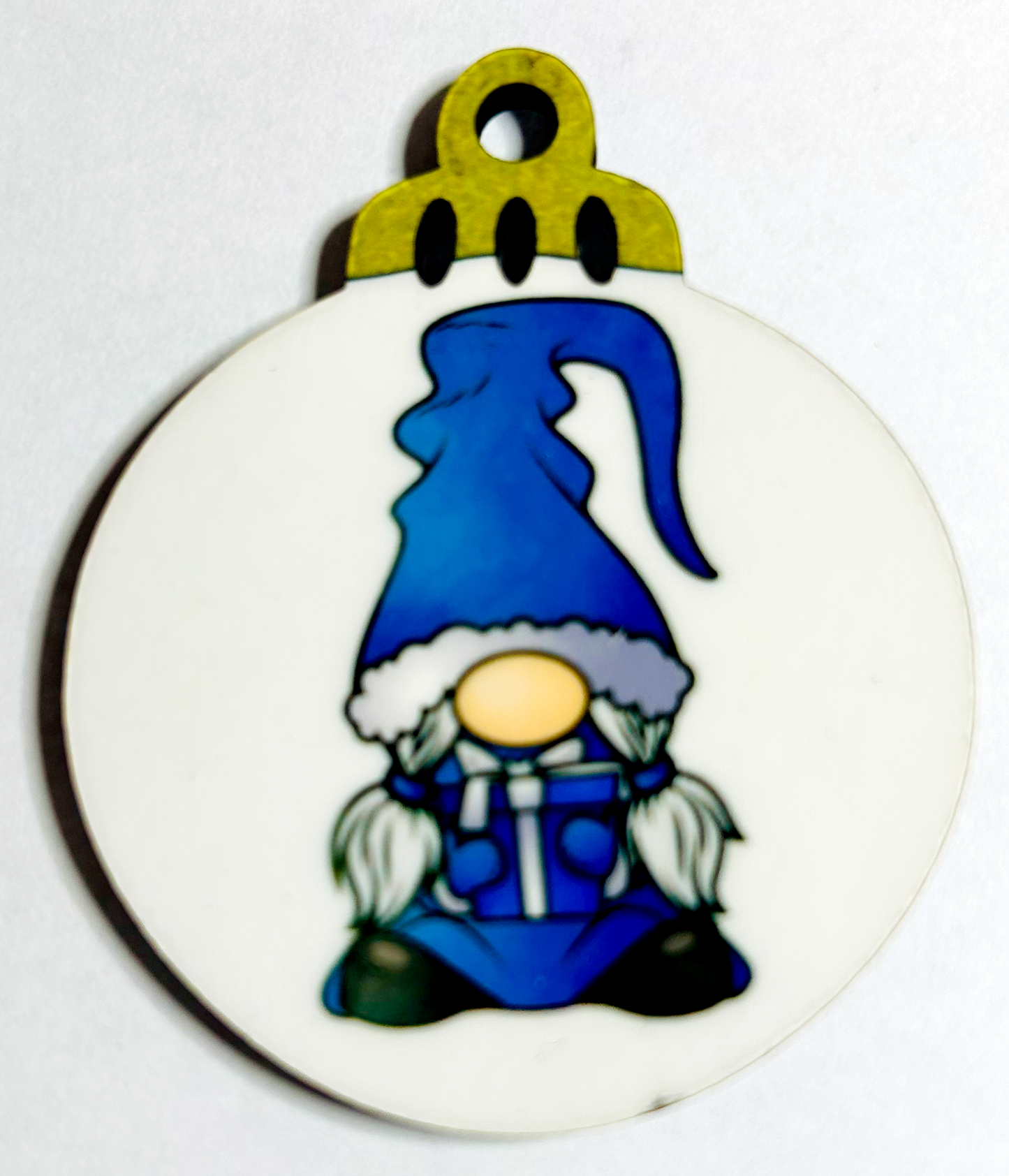blue girl gnome with present on 2" MFD ornament