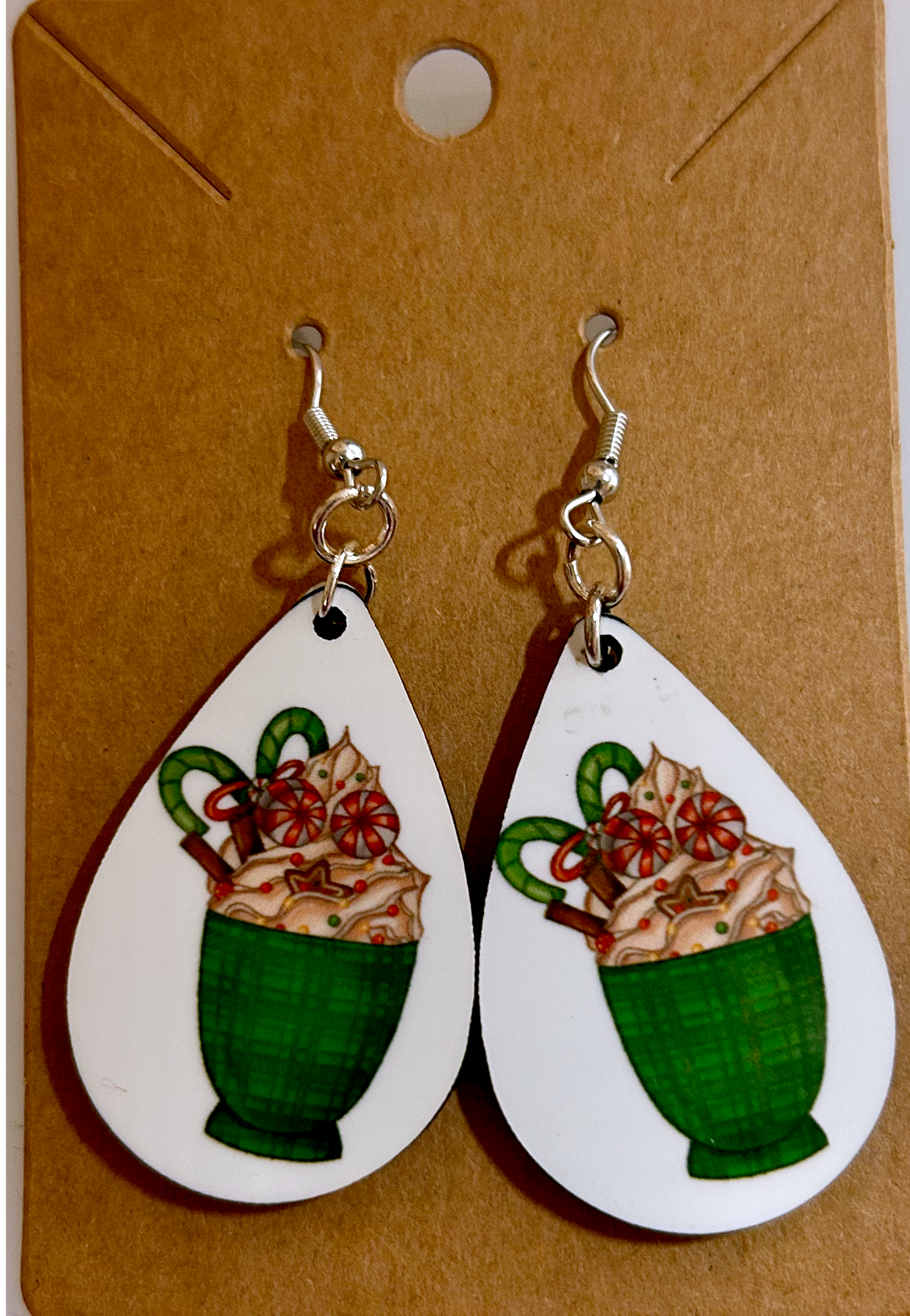 green plaid coffee cup with Christmas candy teardrop shaped earrings