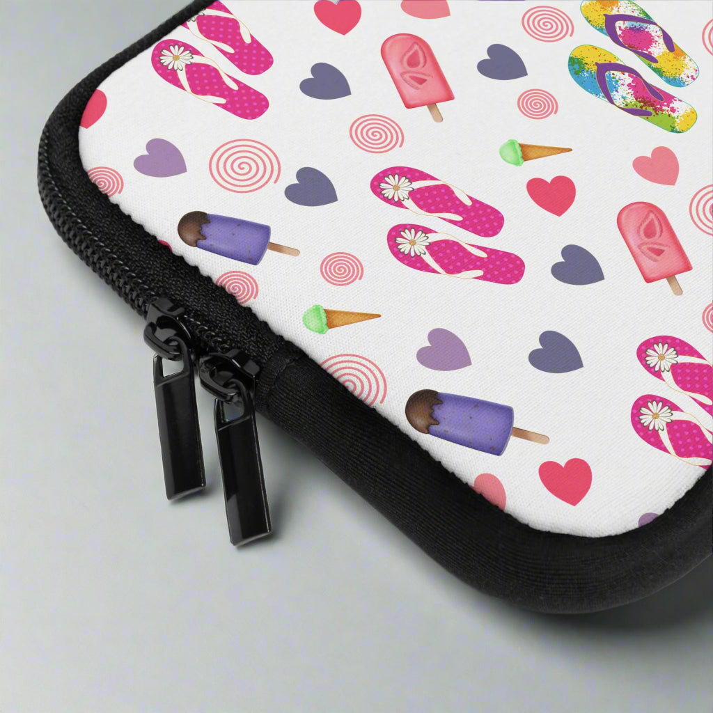 Small pouch with colorful pattern of flip-flops, ice cream, and hearts on a white background