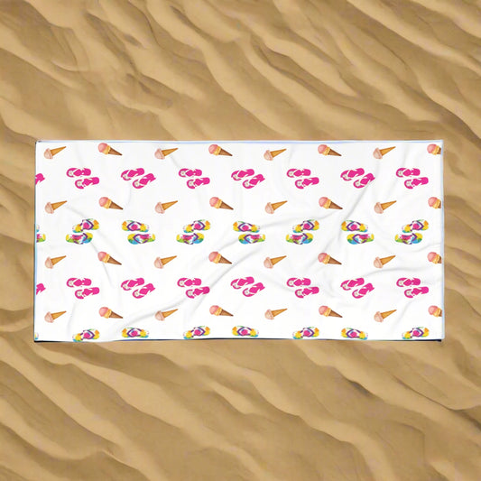 beach towel with flip flop and ice cream
